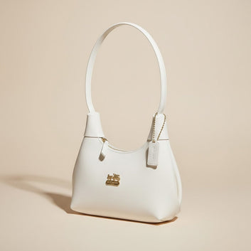 White Coach Handbag with Gold Logo 0027